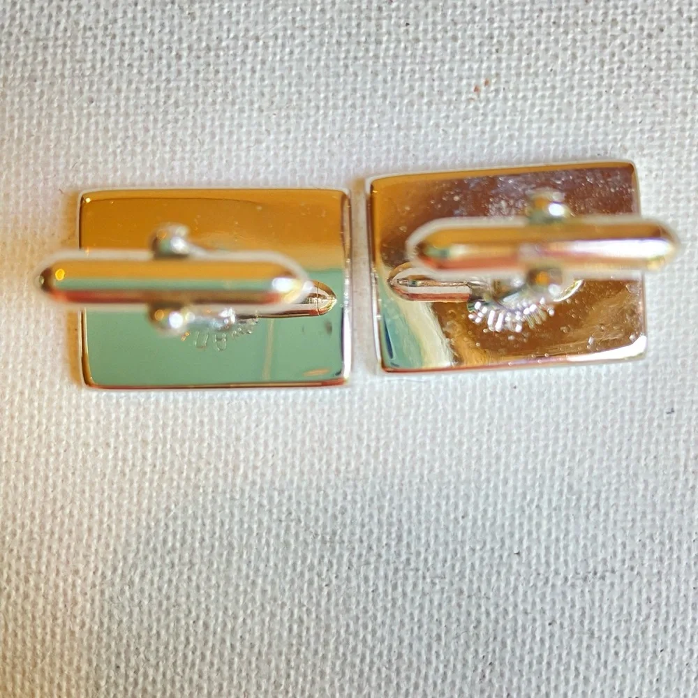 SWANK gray rhinestone cuff links in rectangular silvertone metal setting signed